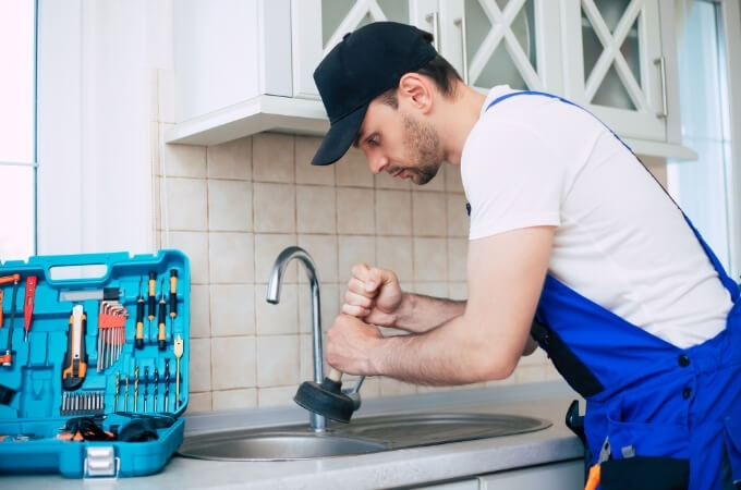 plumber-fixing-a-tap-is-tap-water-safe-tip