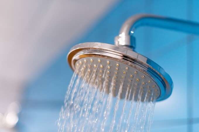 saving-shower-head-in-bathroom