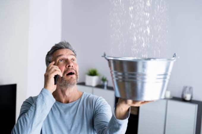 a-man-holding-bucket