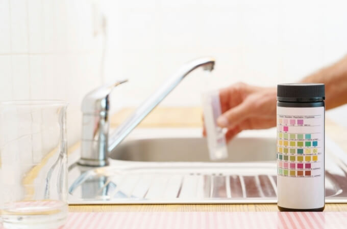 water-in-adelaide-picture-of-kitchen-tap-with-lady-holding-cup-under-tap